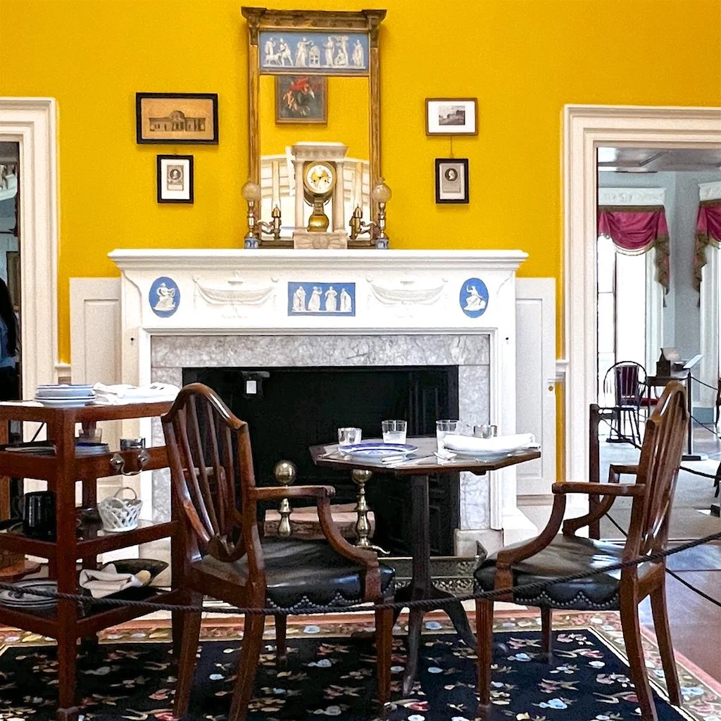 North Wing: The north wing includes two guest bedrooms and a dining room. It has a dumbwaiter incorporated into the fireplace, dumbwaiters, and a pivoting serving door with shelves. Originally unpainted plaster, the dining room was "chrome yellow," f