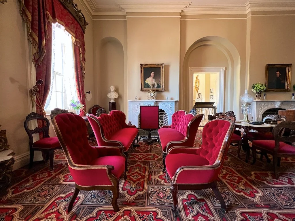 White Parlor: Robert and Mary Lee furnished this formal parlor in 1855. The décor reflects Lee's tastes. Lee also designed the marble mantelpieces with leaf carvings to symbolize Arlington's oak forest.