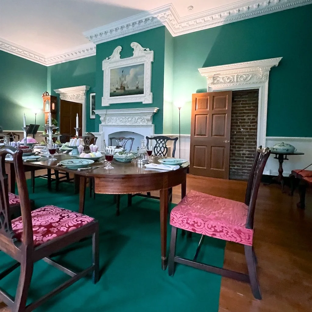 Dining Room: The faux door to the right is open and shows the brick walls used for the house. The same Rococo influence can be seen in Buckman's designs for James Mason's Gunston Hall.