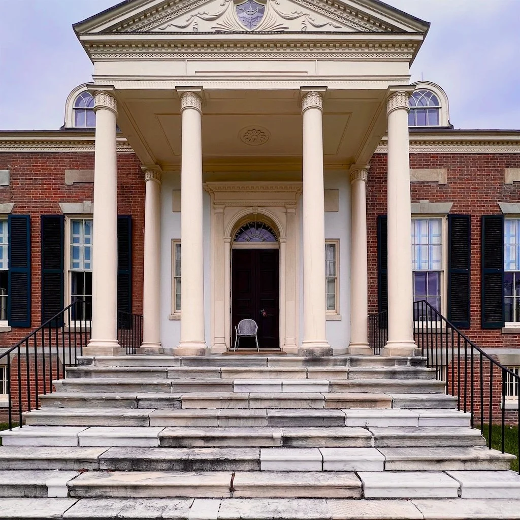 Homewood South Facade: The design of Homewood Estate is five-part Palladian using Federal-style detailing. 