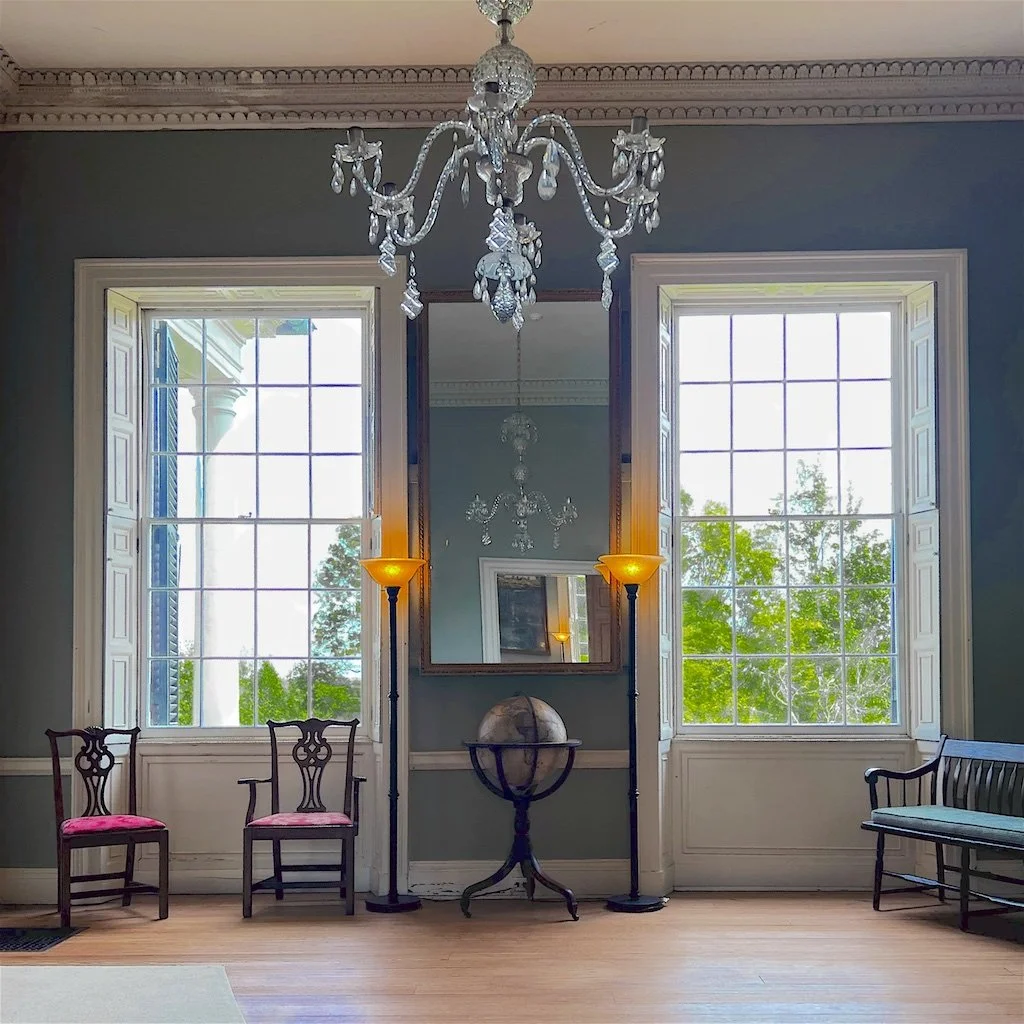 The Parlor: Trust experts have researched the many layers of paint, discovering the original bluish green of the parlor walls and the dove gray of its woodwork.