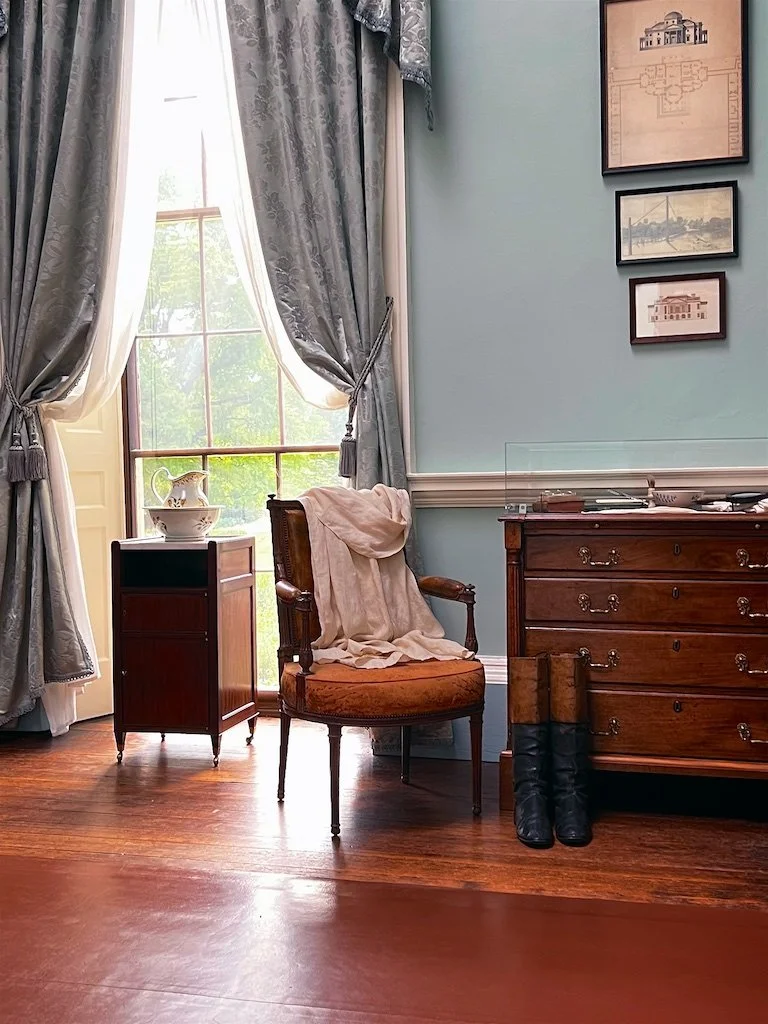 Bed Chamber: Jefferson furnished his Bed Chamber with silk curtains, marble-topped tables, and upholstered armchairs from his house in Paris. Mixed in is the Virginia-made bureau his wife used during their marriage.