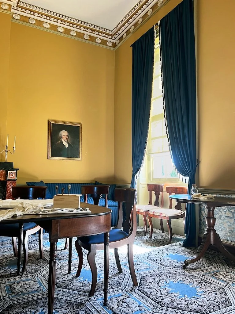 Dining Room: One feature of Riversdale is the 16-foot ceilings. Glass was very expensive then, and heating costs would have been much more costly - but the effect is priceless.