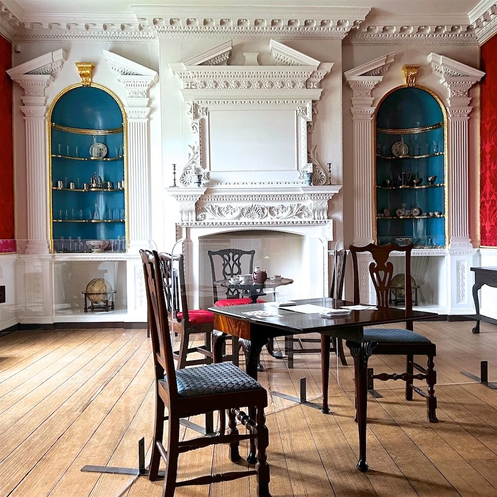 The formal, Palladian-style room in Gunston Hall features rococo woodwork. Two gifted English indentured servants, carpenter and joiner William Buckland and master carver William Bernard Sears, were responsible for the interior work.