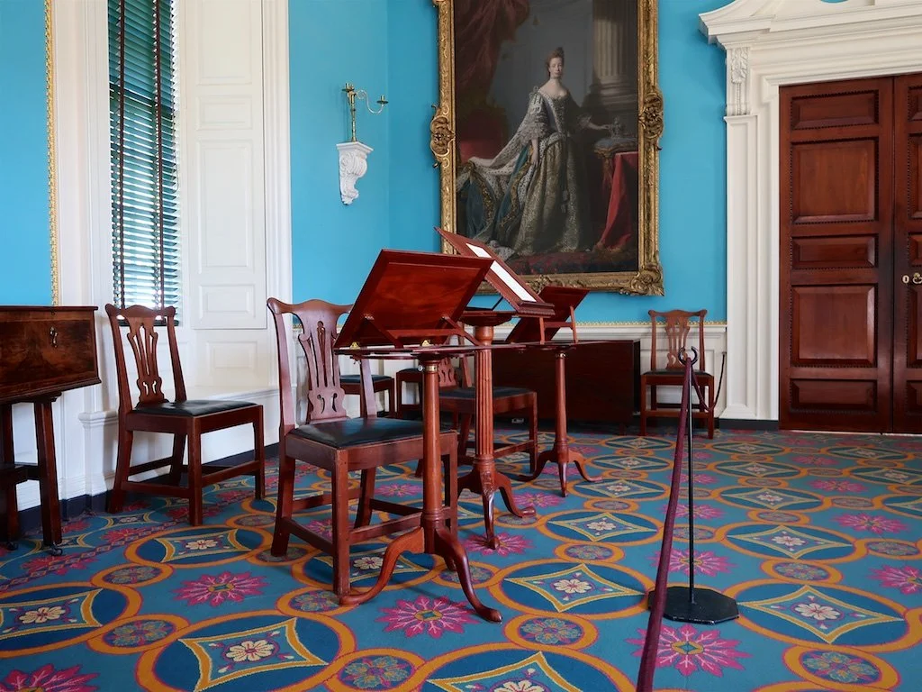 Ballroom: The carpeting is inspired by a 1770 detailed inventory that had been prepared after the death of Lord Botetourt, Virginia's royal governor. It is indicated as rolled up on the third floor. These rooms are interpreted as used by the last Roy