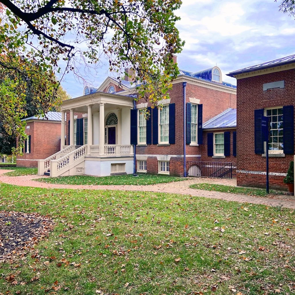 Homewood North Facade: The garden facade has a flat portico. The house is built of Flemish-bond brick with stone trim.