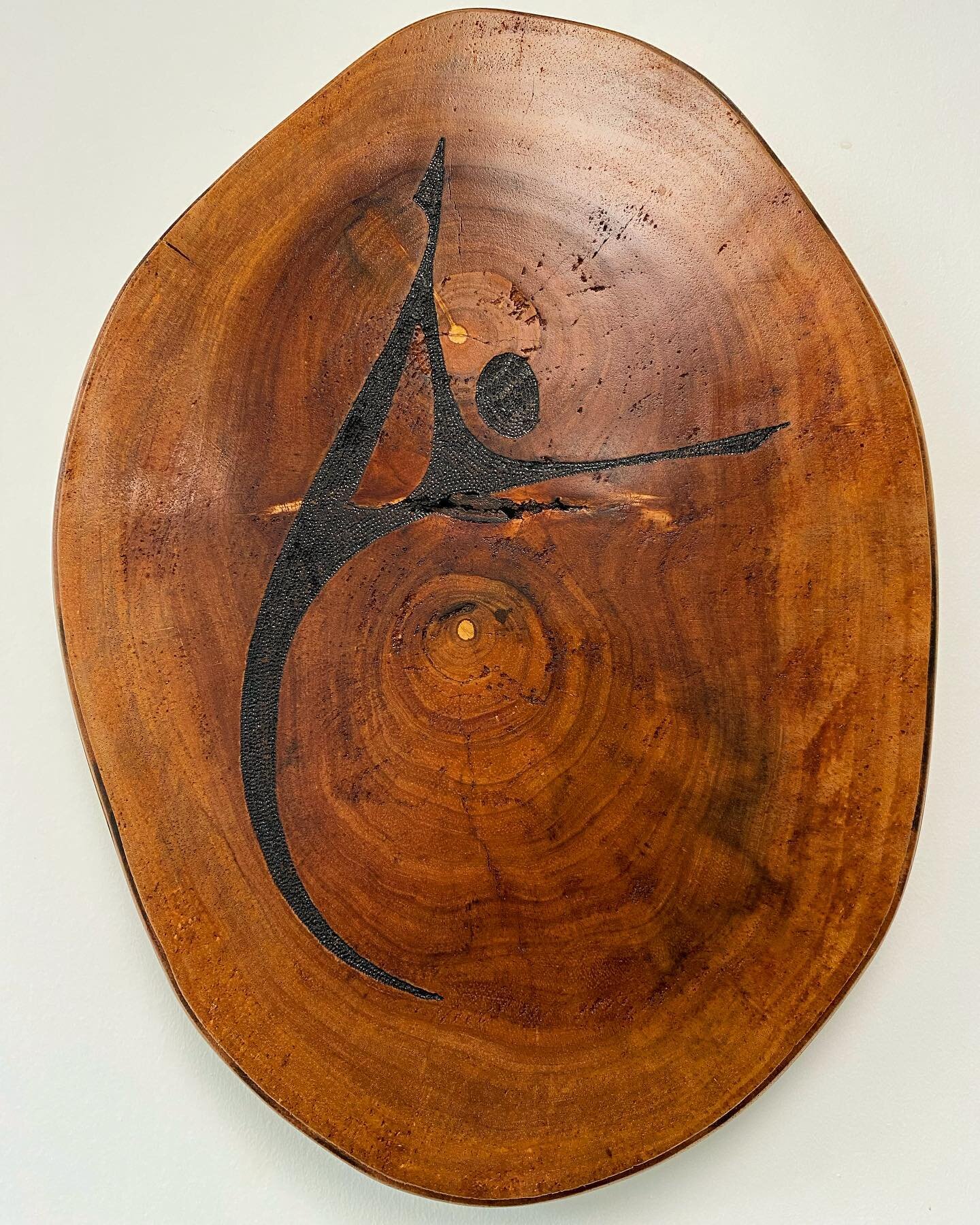 Those of you who&rsquo;ve practiced with us have seen this beautiful piece guarding the sun room peacefully in standing bow pulling pose. The wood is from a Seike hardwood tree. This is a unique piece of wood because it has two hearts in it and it wa
