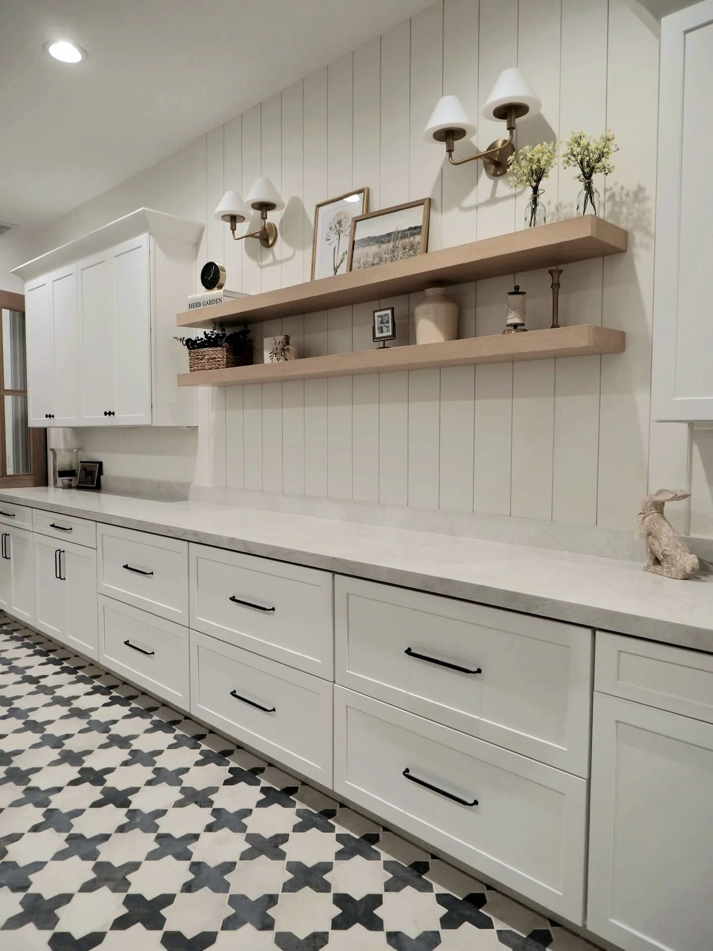 White farmhouse-style kitchen with finished cabinetry
