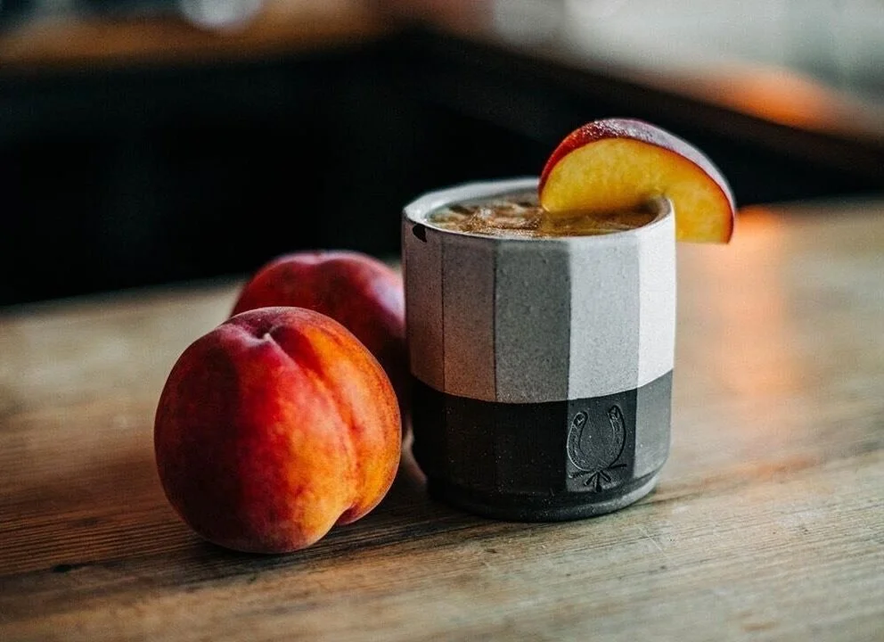 Cup with peaches shot by Indy Coffee Club