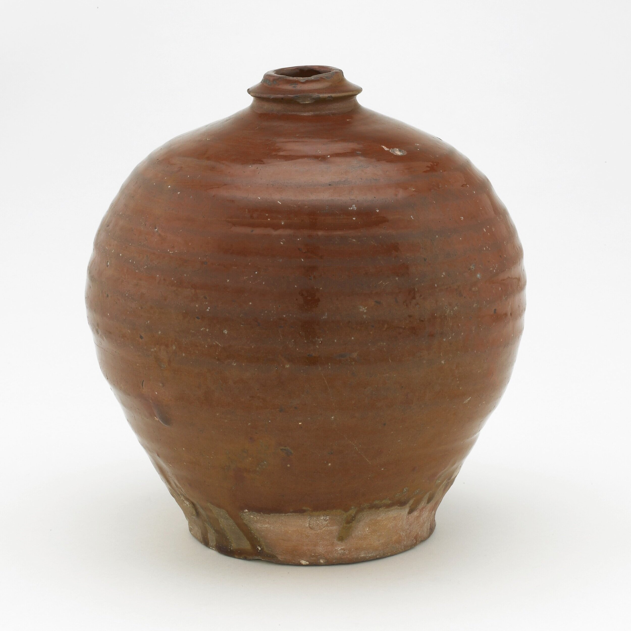 Bottle+Jin+dynasty+13th+century+Earthenware+with+red+slip+under+iron-yellow+lead-silicate+glaze+9.6+x+18.4+cm.jpg