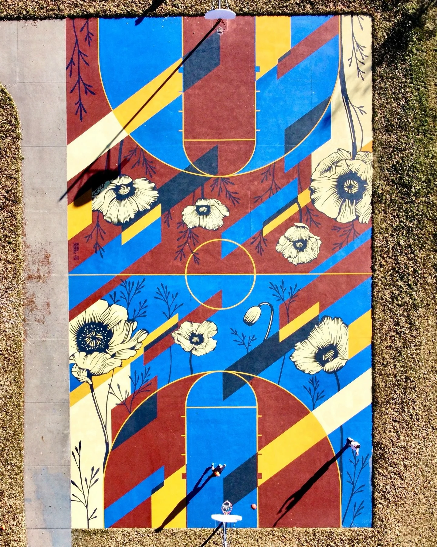 Our basketball court mural at Fuller Park in Denver is now complete! 

We started talking about painting a basketball court over two years ago so seeing it finally come to life is a great feeling. This court took 300 gallons of paint mixed with 900 p