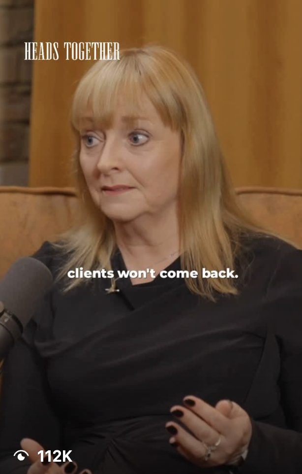 A woman with blonde hair and black nail polish sitting in a room with wooden walls, appears to be in an interview or conversation, with a microphone visible in the foreground. Text on the image says "Heads Together" and "clients won't come back."