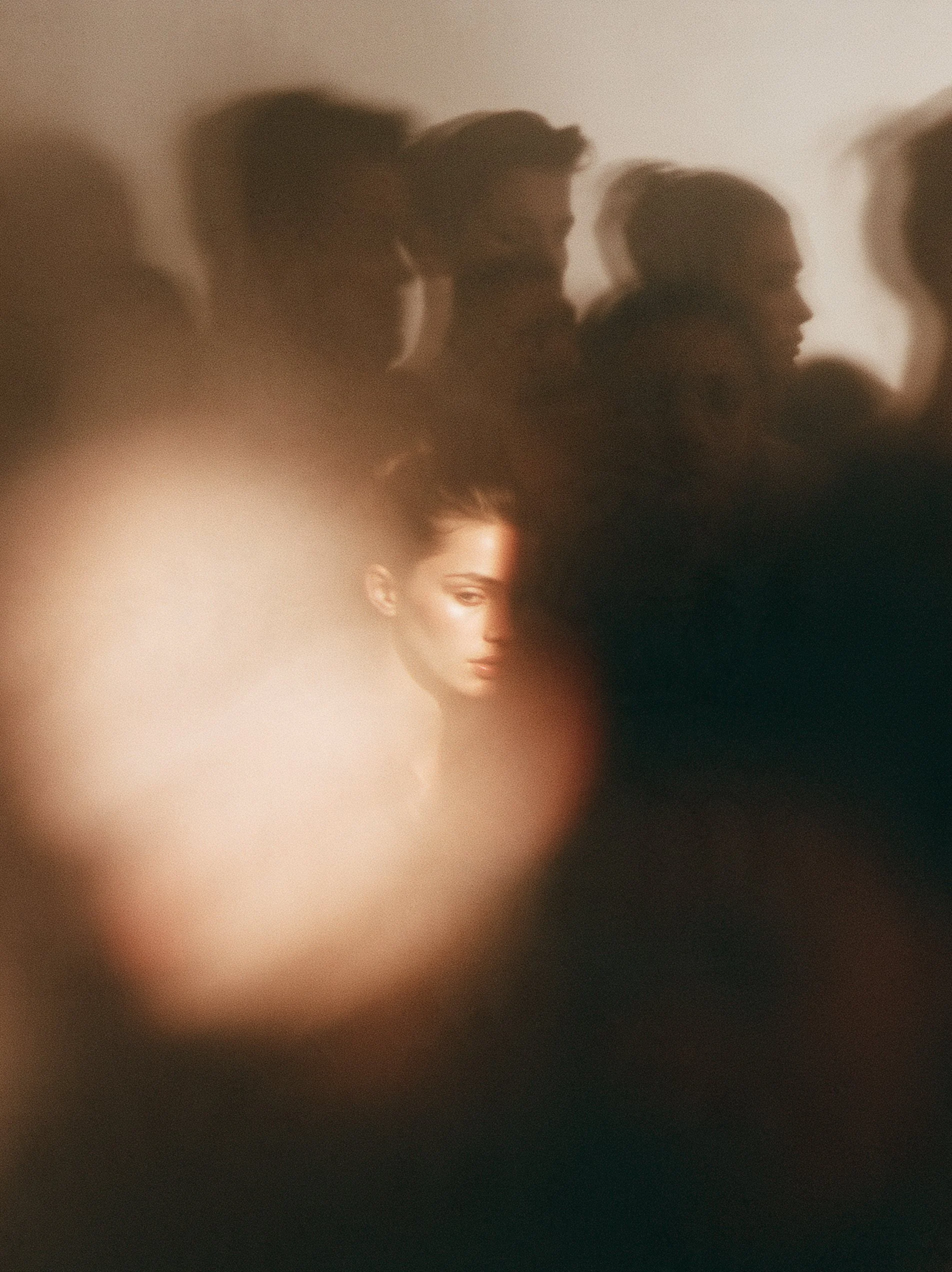 Big Little Content: a salon mirror reflecting a crowd of faces with only one lit