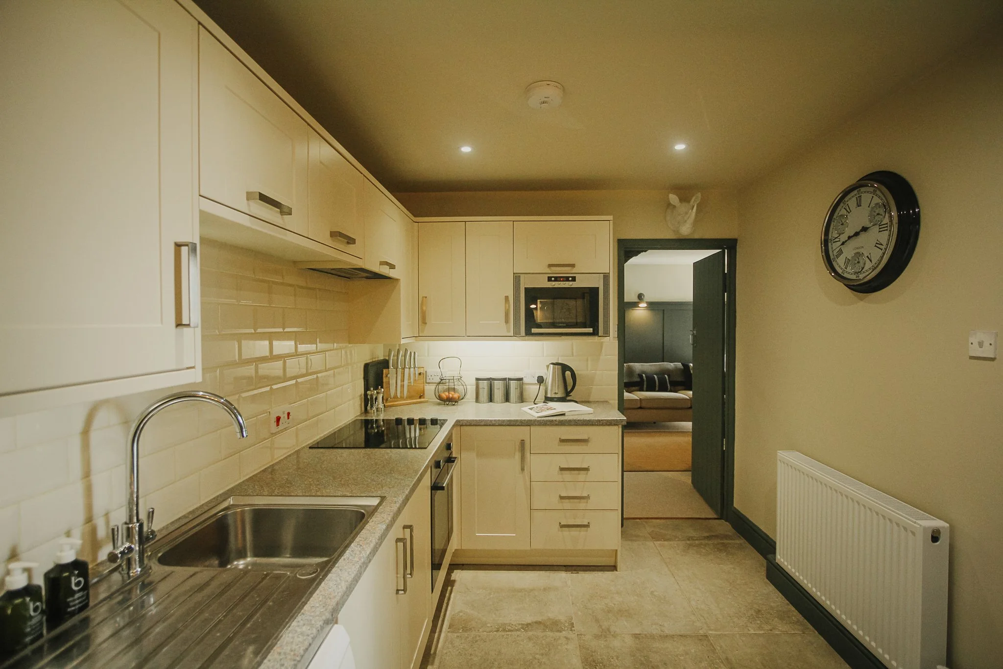 Large kitchen area leading off to lounge