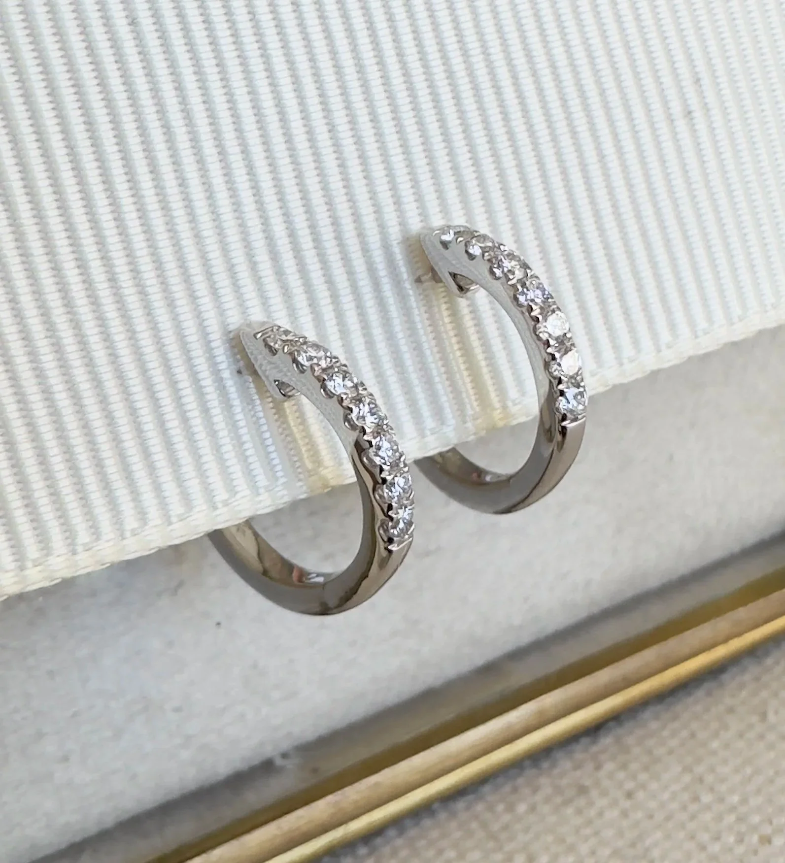 diamond hooped earrings in 18ct white gold