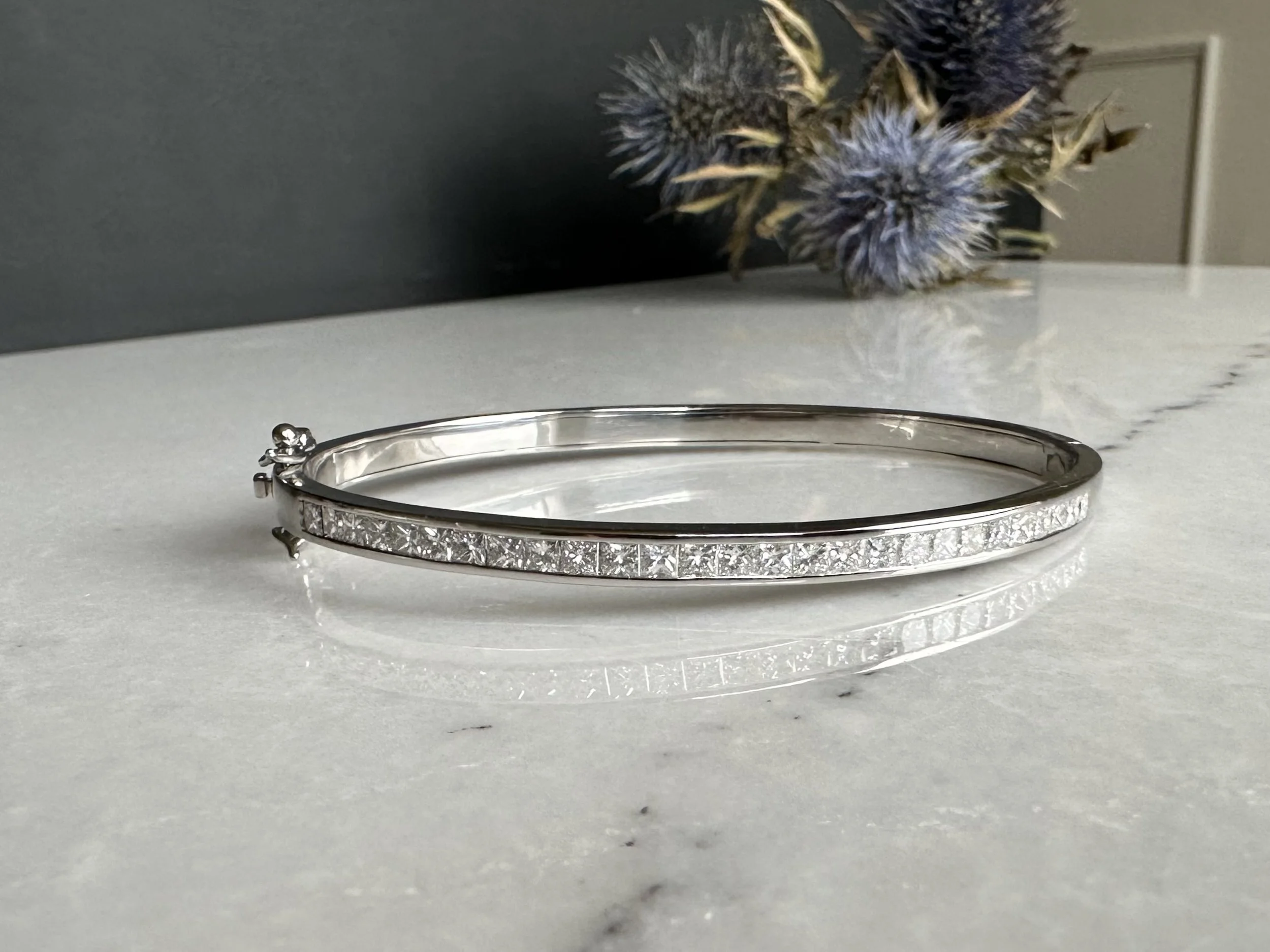 Diamond bangle created out of inherited diamonds