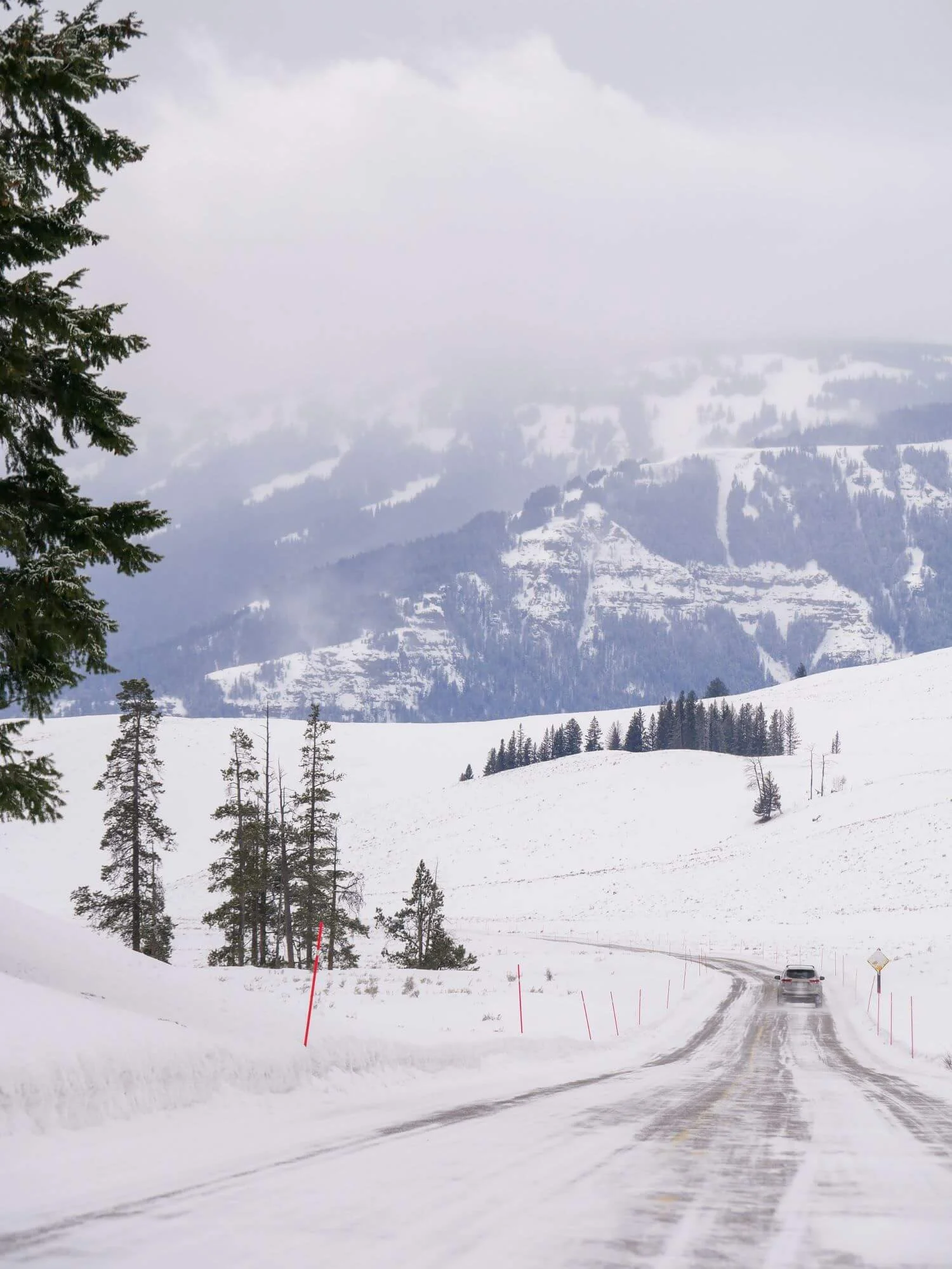 car driving on snowy road
