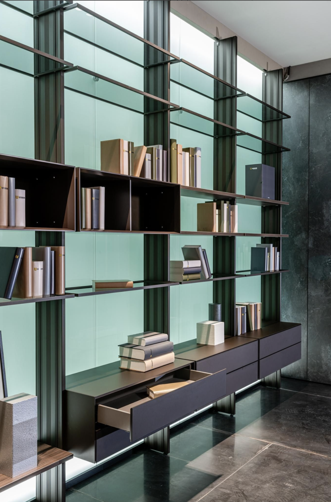 High end contemporary book case available from wood, metal and glass.