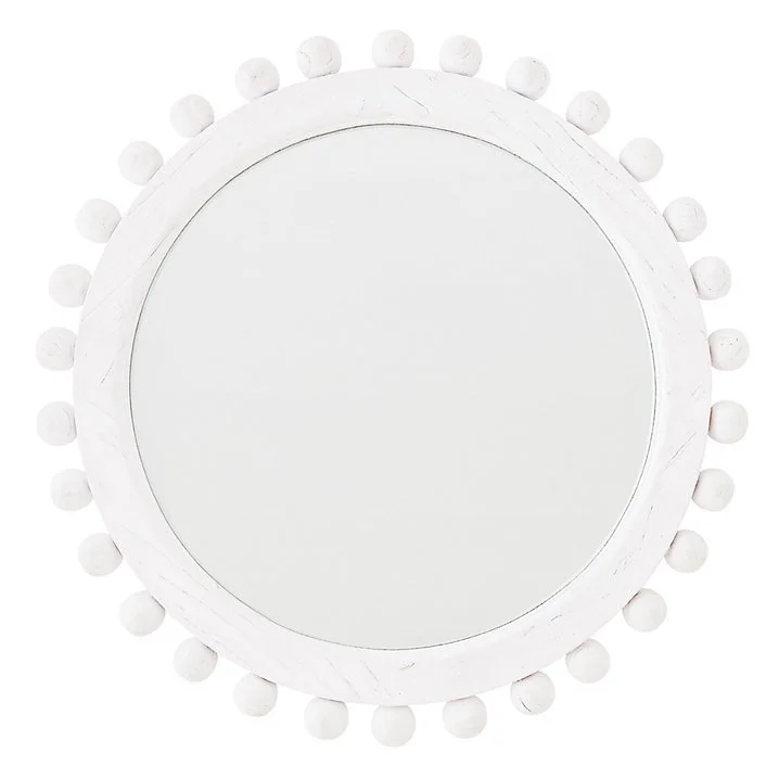 white round wall mirror