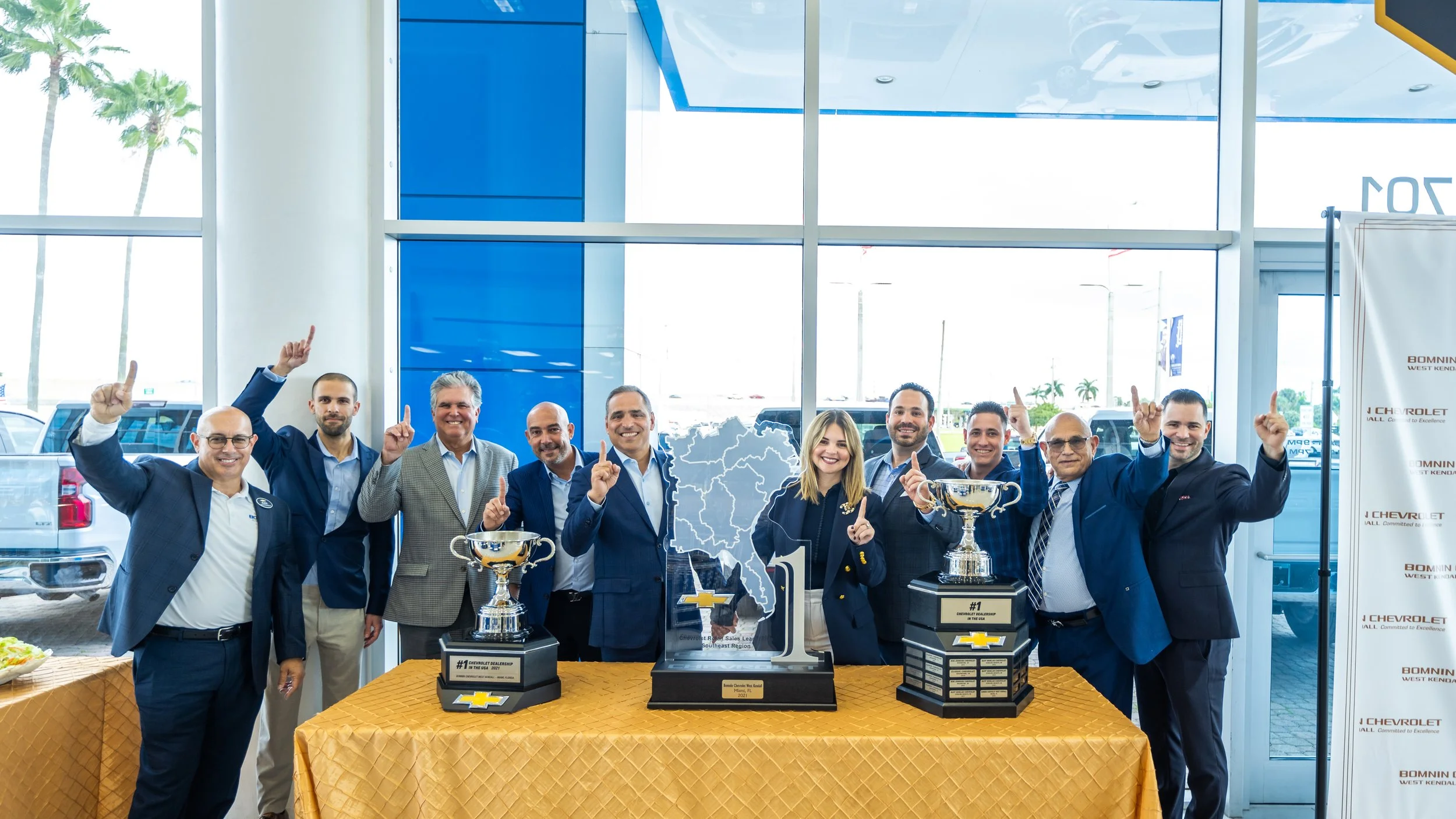 Bomnin leaders celebrating with their #1 in the nation trophies