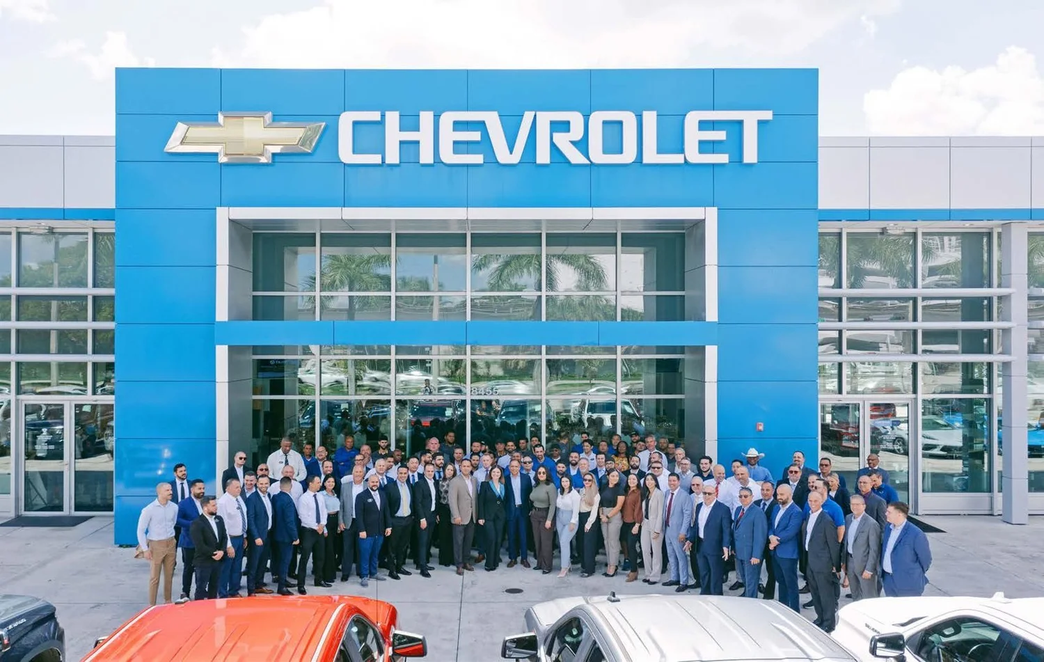 The Bomnin team in front of a new Bomnin Chevrolet dealership