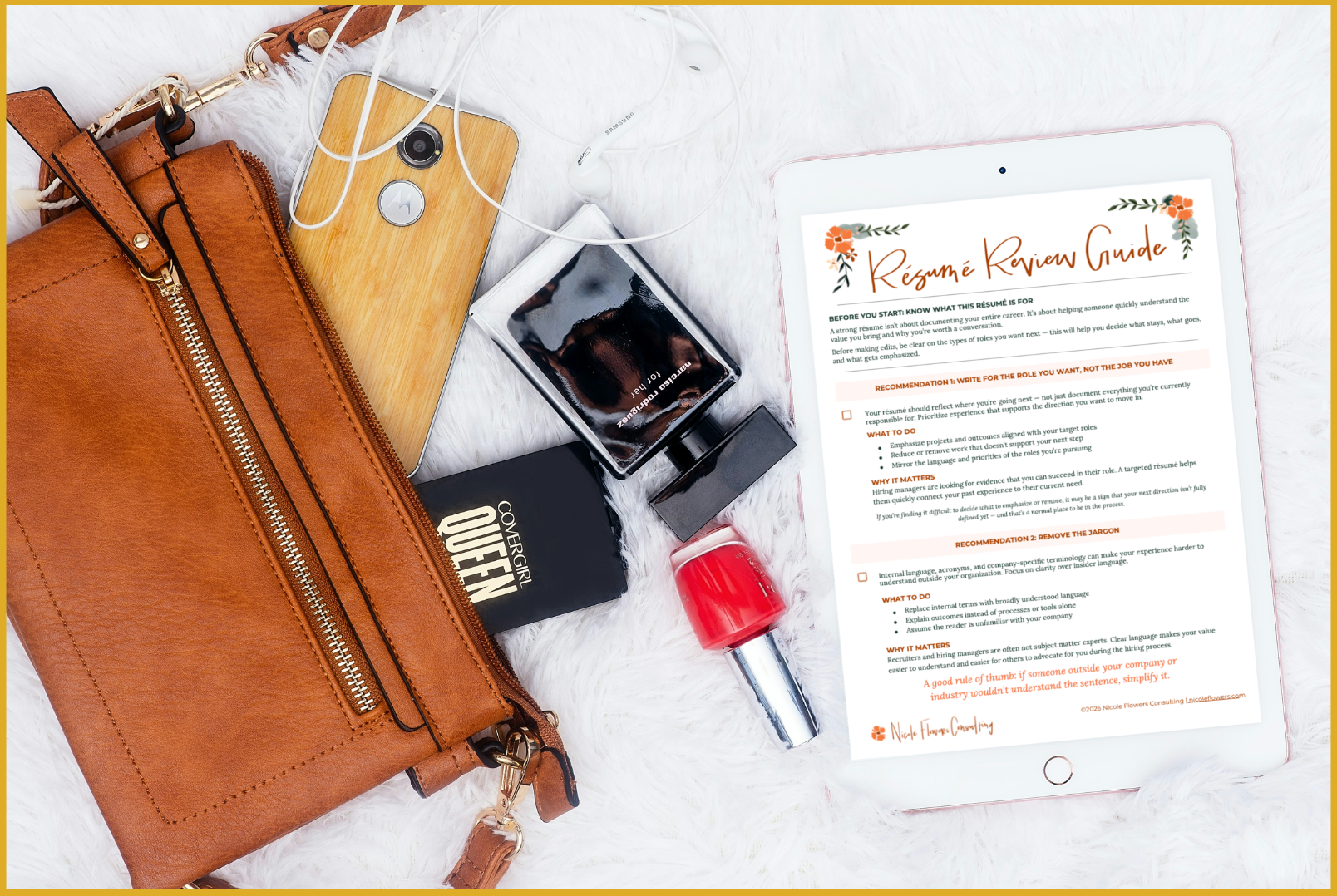 A flat lay of a brown leather bag, a smartphone, a makeup item, a tablet displaying a resume review guide, a small perfume bottle, and wired earbuds on a white fuzzy surface.
