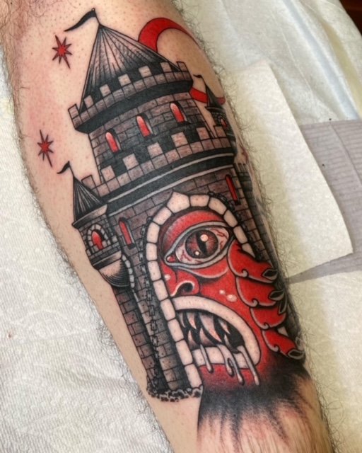 neo traditional monster castle tattoo