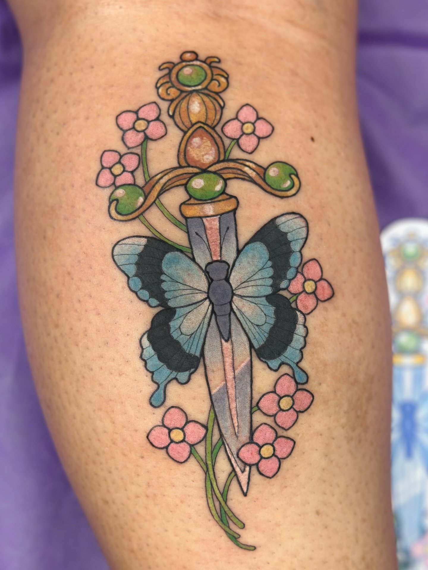 Butterfly dagger 🦋 
.
Would love to do more like this! Designs from my flash page @bons.lagoon I have a couple spots in Feb I&rsquo;d love to fill 💖 Tattoo booking form linked in bio 
.
butterfly dagger tattoo kawaii dagger neotraditional color but
