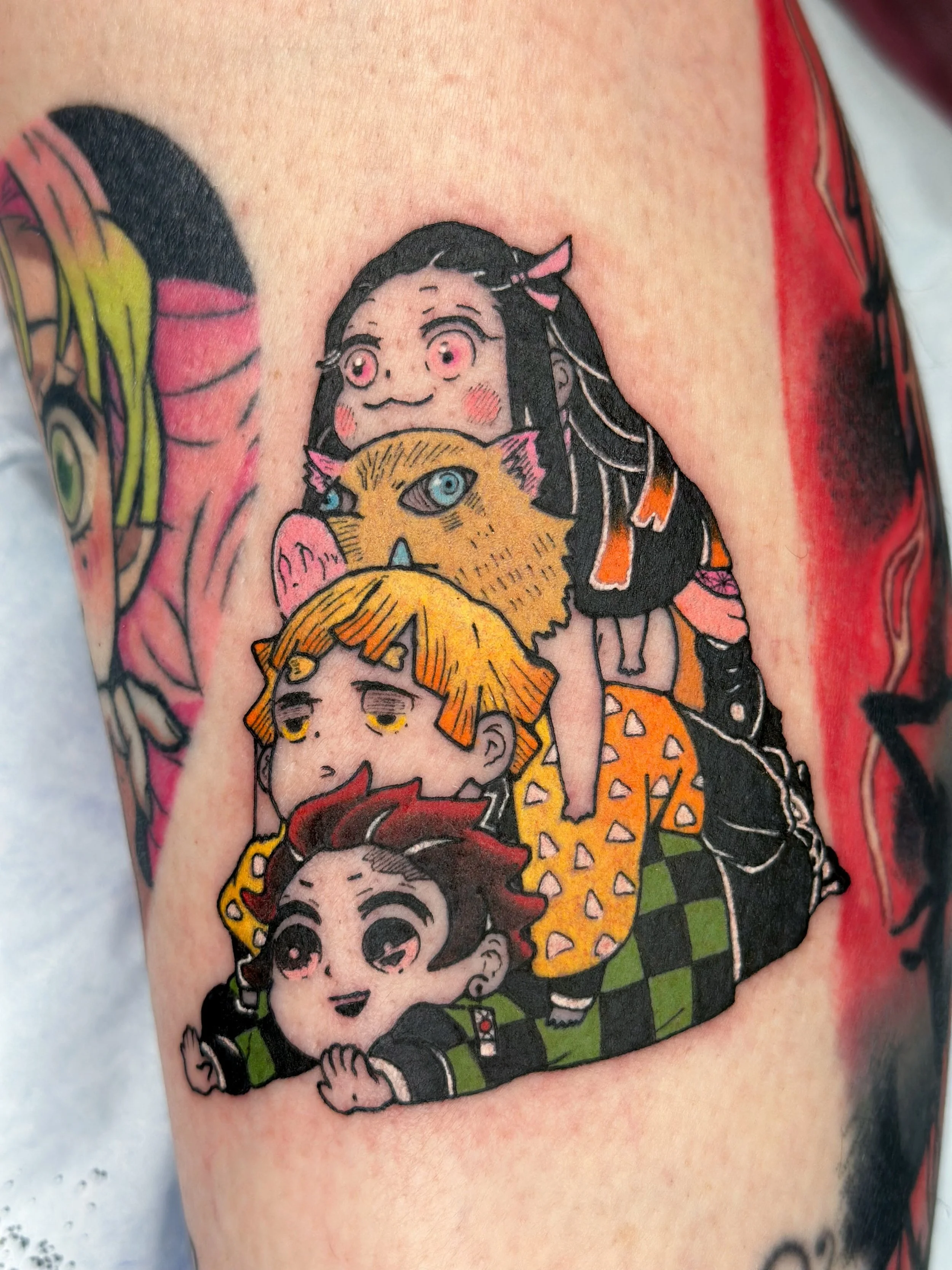 Loved working on this colored in manga panel / demon slayer stack! 
.
Books open for June - July! Link in bio or dm for flash ❤️
.
#colortattoo #demonslayertattoo #mangatattoo tanjiro zenitsu nezuko inosuke tattoo