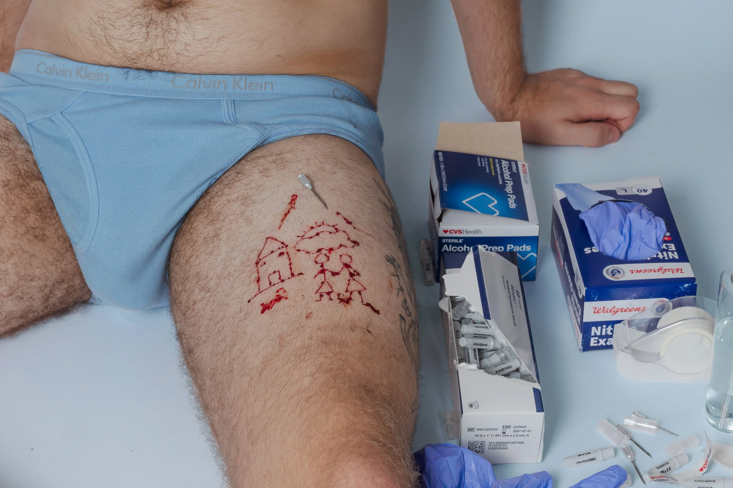 after "self portrait/cutting" by Catherine Opie