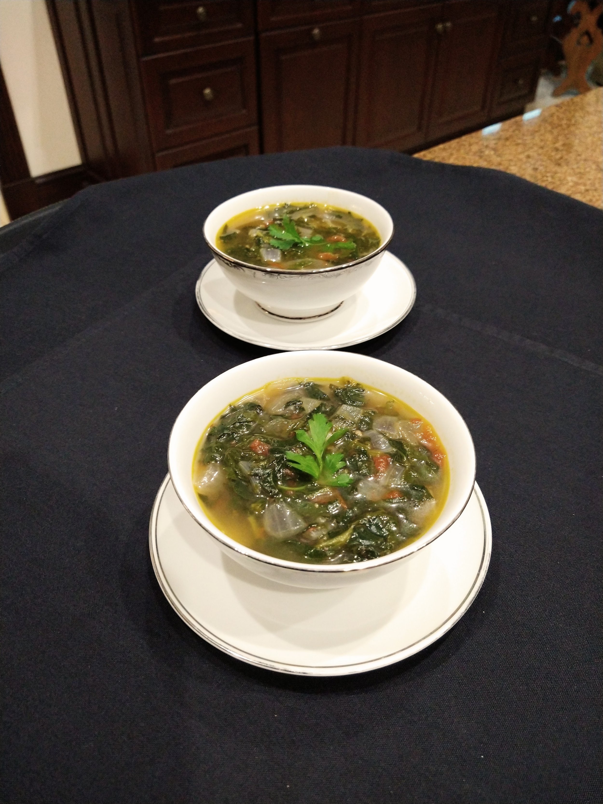Serve spinach and tomato healthy soup of the Mediterranean Diet recipe