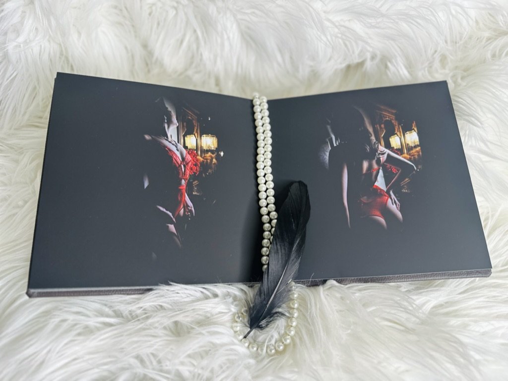 Luxury boudoir album spread featuring fine art images from a private session in Round Rock serving the Austin area