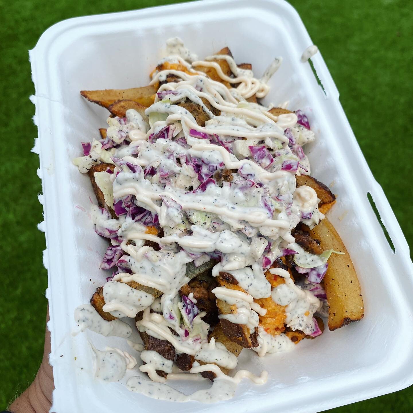 Have you tried our Bacun Chedda Fries? It all starts with fresh whole organic russet potatoes that we cut by hand in our kitchen. Then we top them with our house-made chedda, tempeh bacun, and organic cabbage. To top it off we finish with a delightfu
