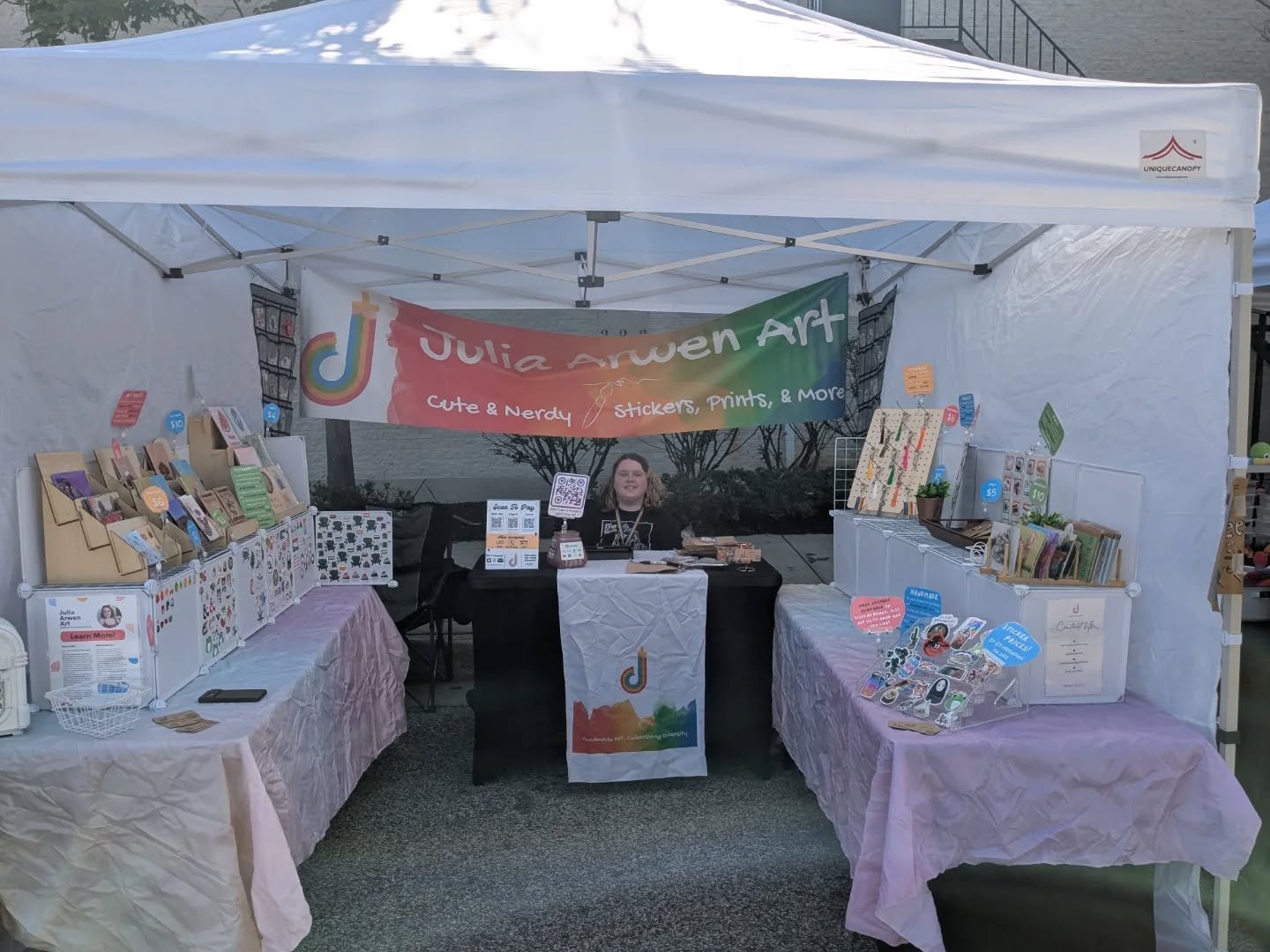Swipe to see just how far we've come! It's wild to think that in 3 years this little business and the booth has grown so much. The second pic is from the very first @arbutusartsfestival we attended in 2022. And the first pic is from today at the 2025