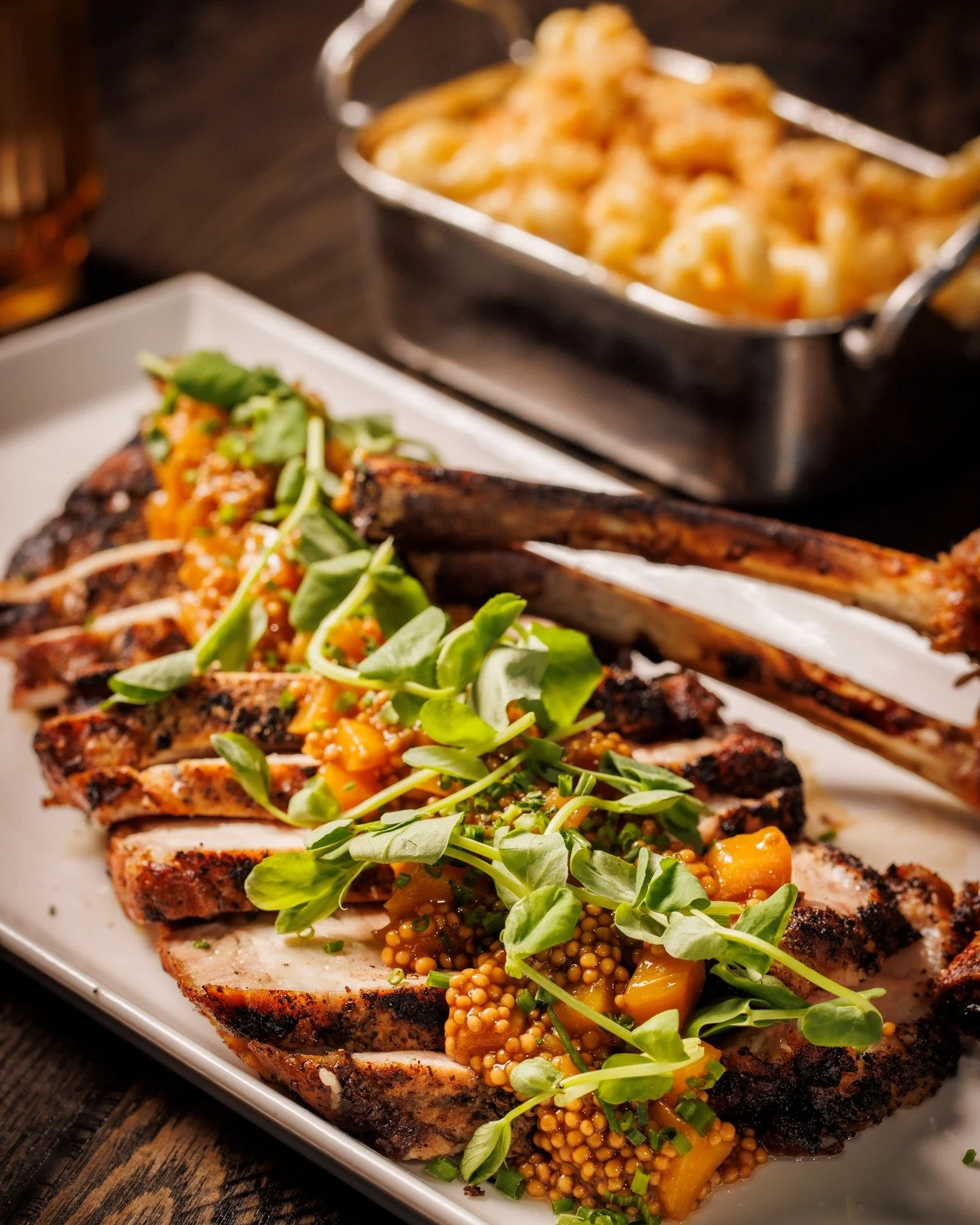 The Saint's double-cut Berkshire pork chop is straight-up legendary&mdash;juicy, perfectly seared, and topped with that tangy peach mostarda for the ultimate sweet-savory vibe. Texas-raised pork meets Italian finesse in the Design District.