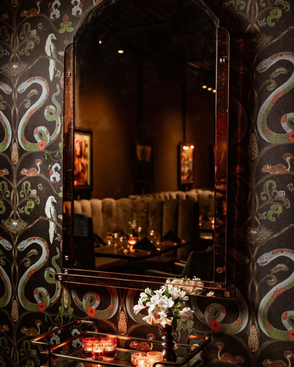 Moody corners, candlelight, and a touch of intrigue.

Step inside The Saint Italian Steakhouse, where every detail is designed to draw you in&mdash;from the rich textures and flickering glow to the intimate reflections that hint at what&rsquo;s to co