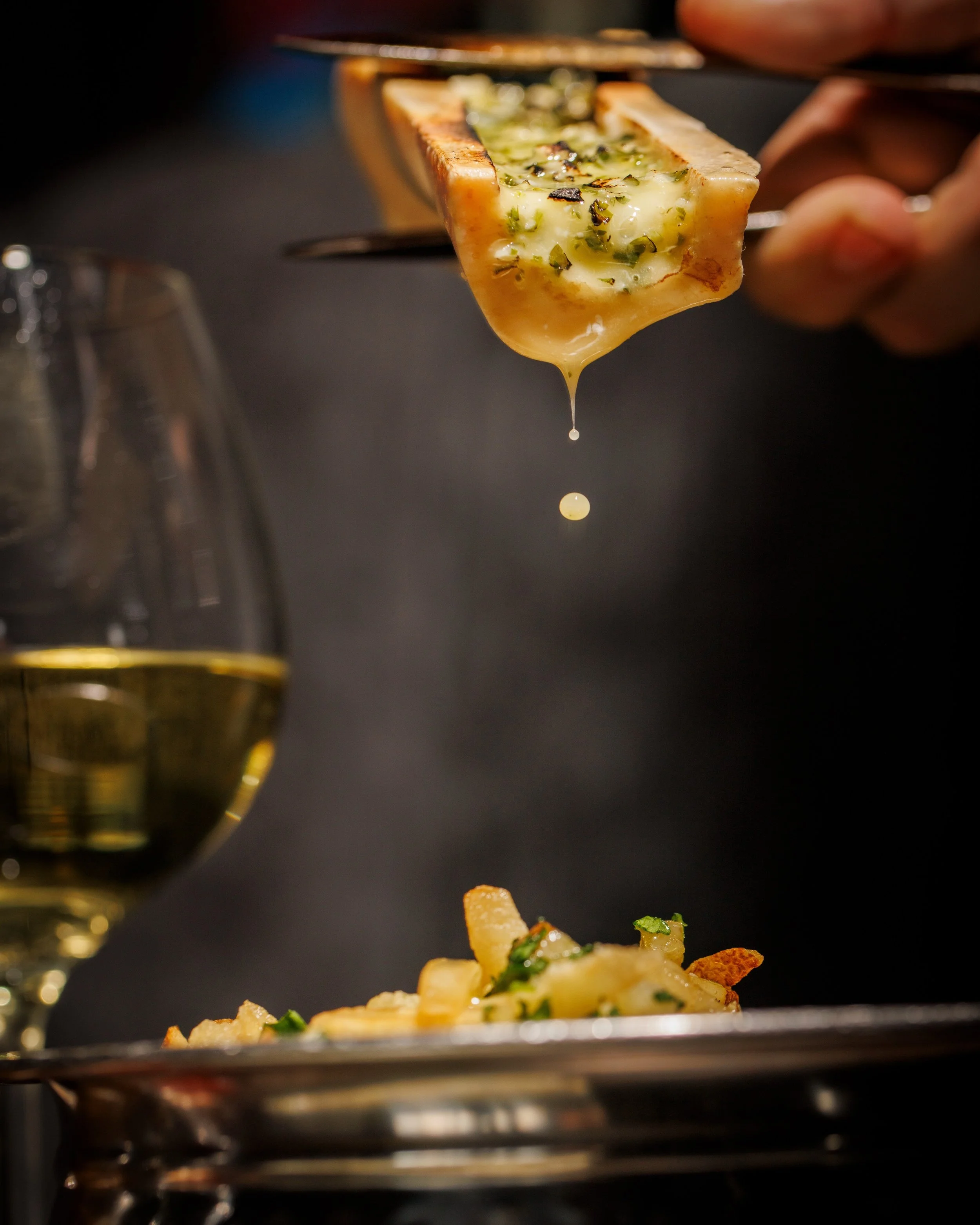 Roasted marrow, golden and rich, spooned over crisp fries with a finishing drizzle of herb-garlic butter. Every bite is unapologetically indulgent. A signature at The Saint Italian Steakhouse.