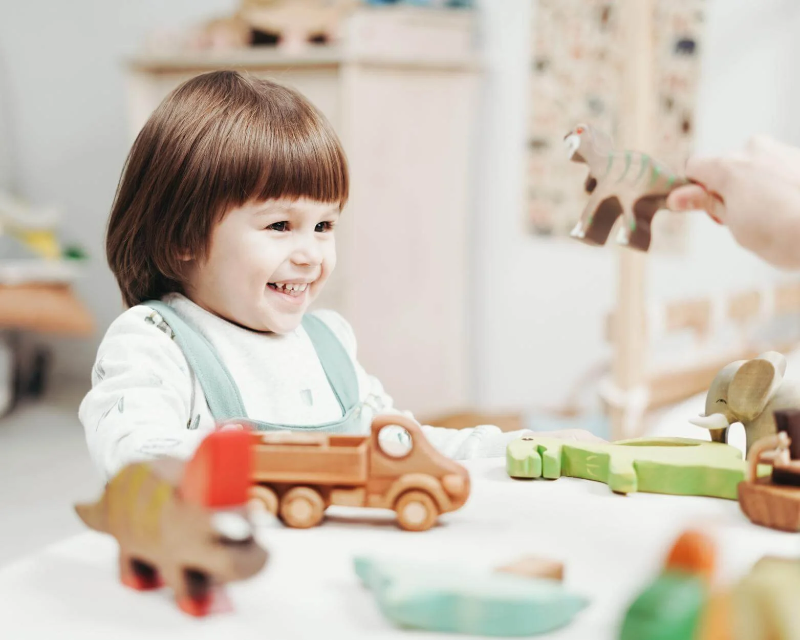 Speech therapist providing social skills therapy to a child in Fairfield County, Connecticut.