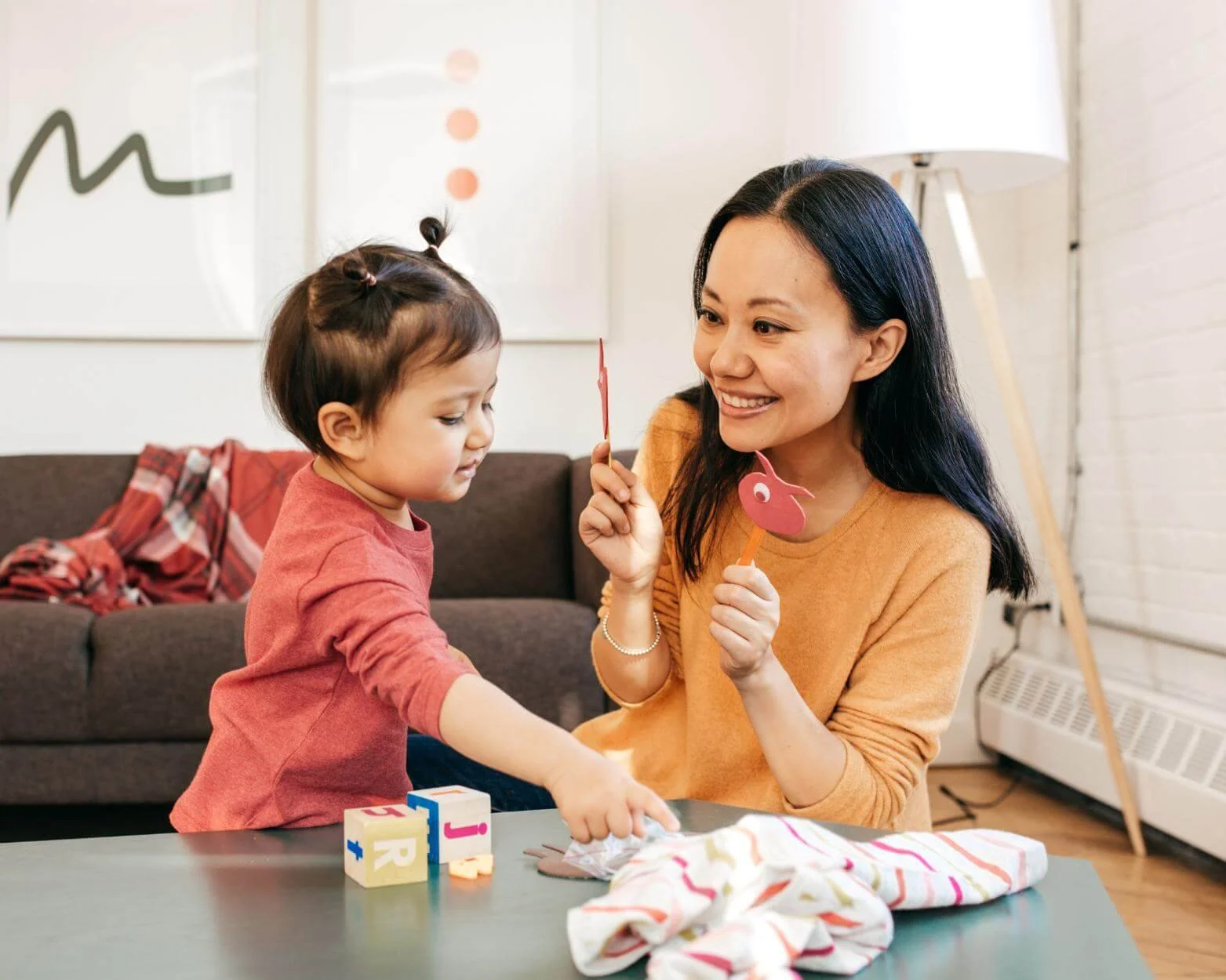 Speech therapist providing parent coaching therapy to a child's parent in Fairfield County, Connecticut.