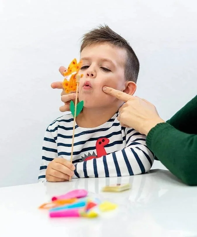 Speech therapist in Norwalk practicing articulation with a child.