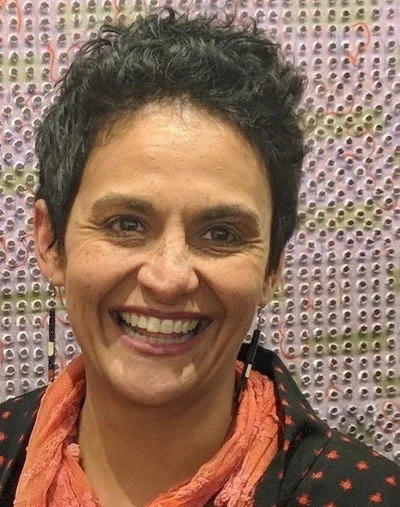 'Headshot' photo of  Toni Hassan. 