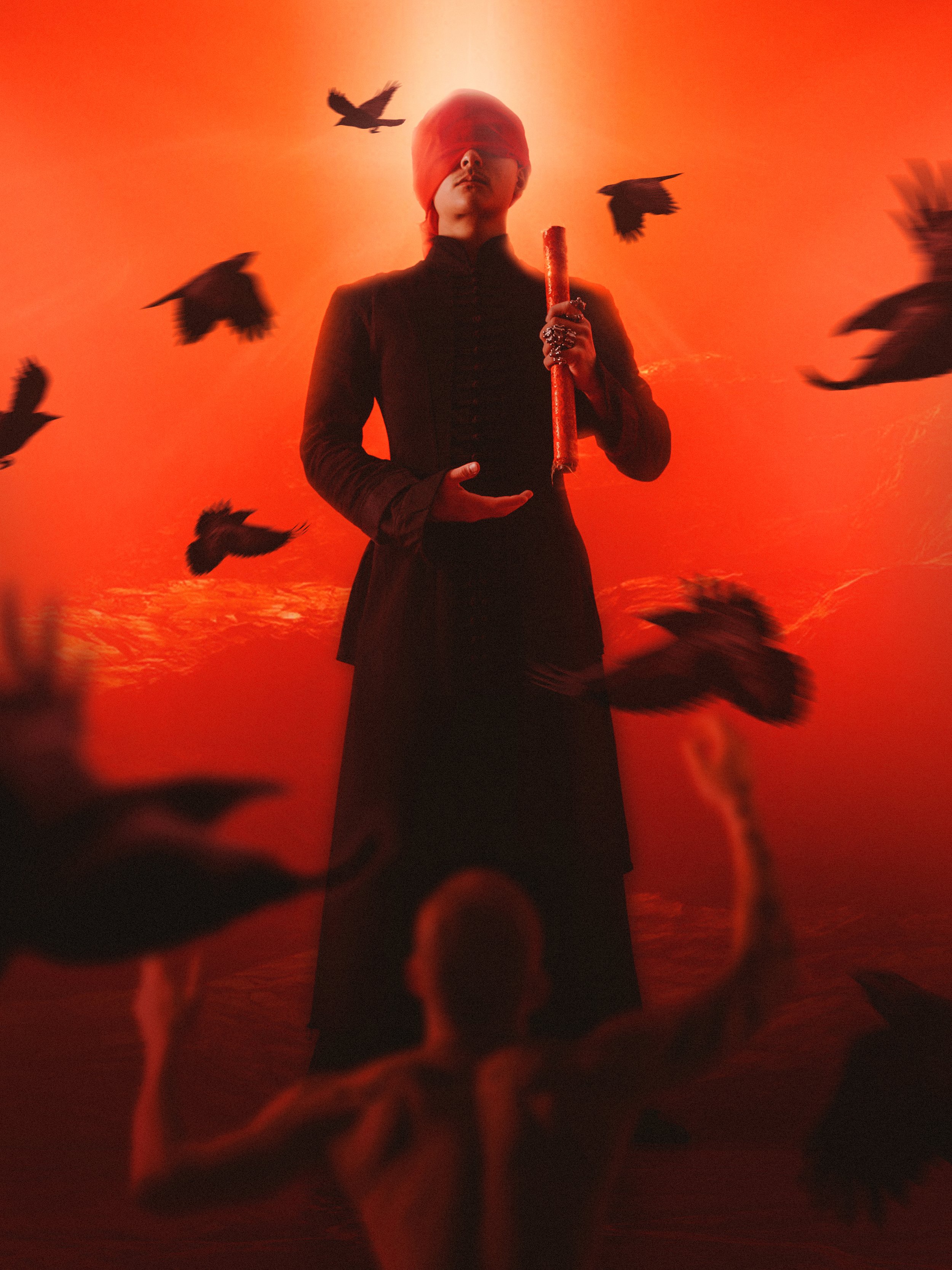 Person with blindfold holding a stick in a dramatic red-lit setting, surrounded by flying black birds.