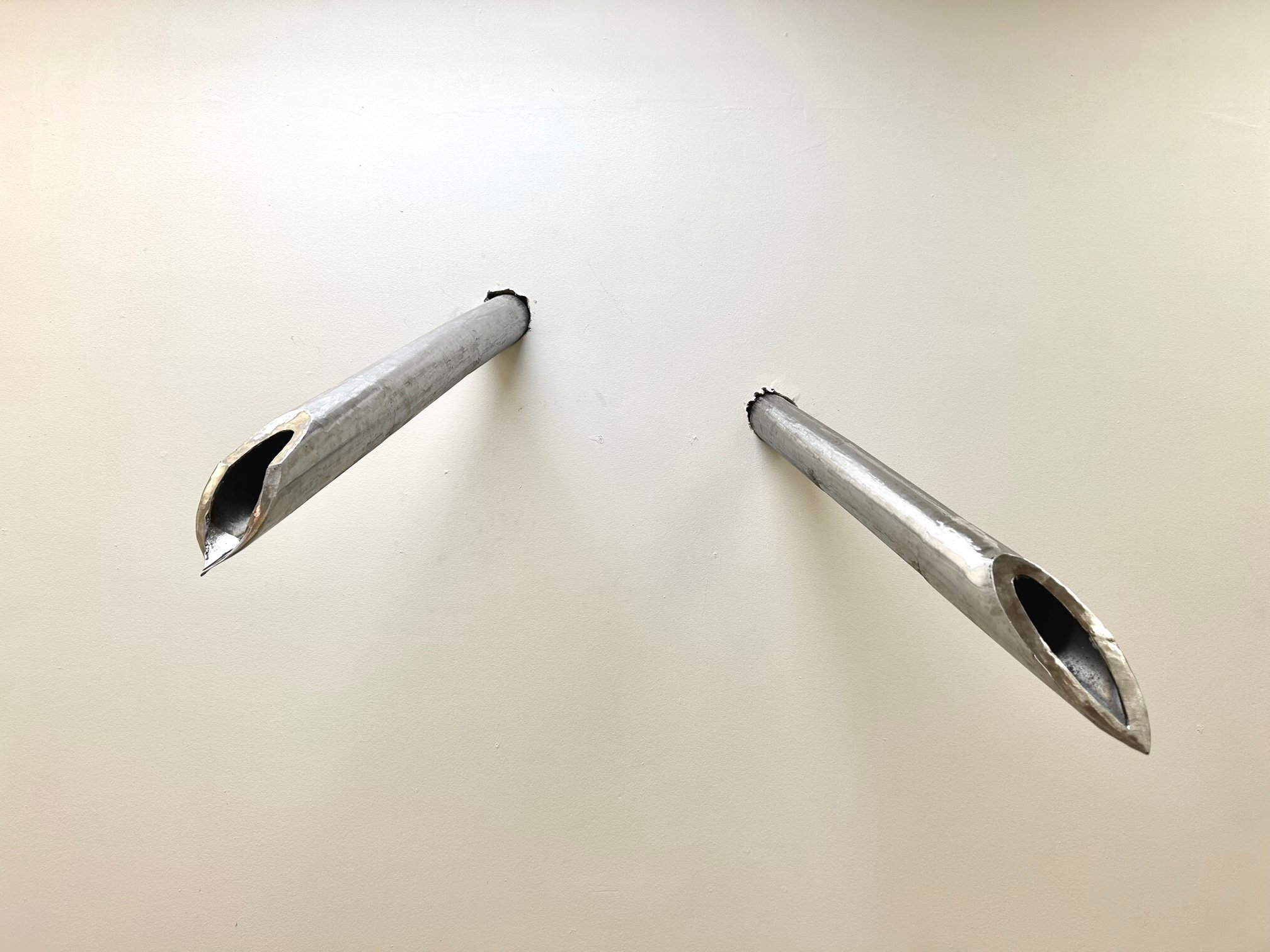 Hand-Signed/Hand-Pierced (2023).
2.5 in x 49 in.
Steel, ink, etomidate.