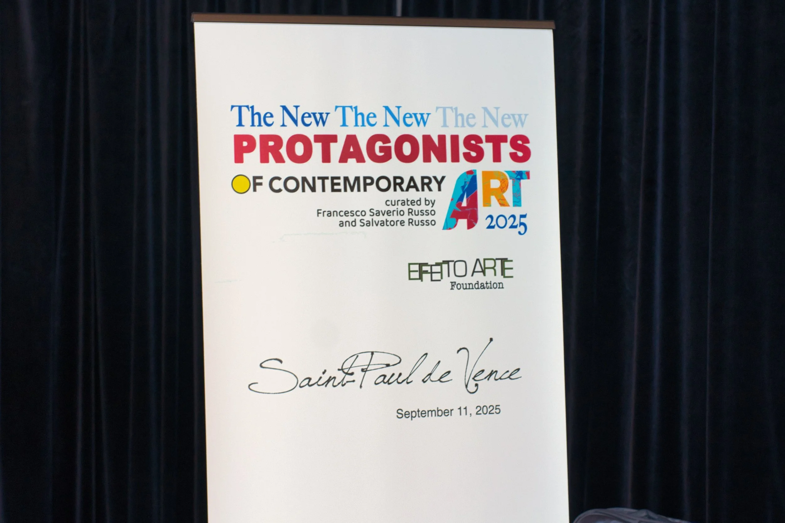 Event poster for contemporary art exhibition titled 'The New Protagonists of Contemporary Art 2025,' curated by Francesco Saverio Russo and Salvatore Russo, with a signature that reads 'Saint Paul de Vence' and dated September 11, 2025.