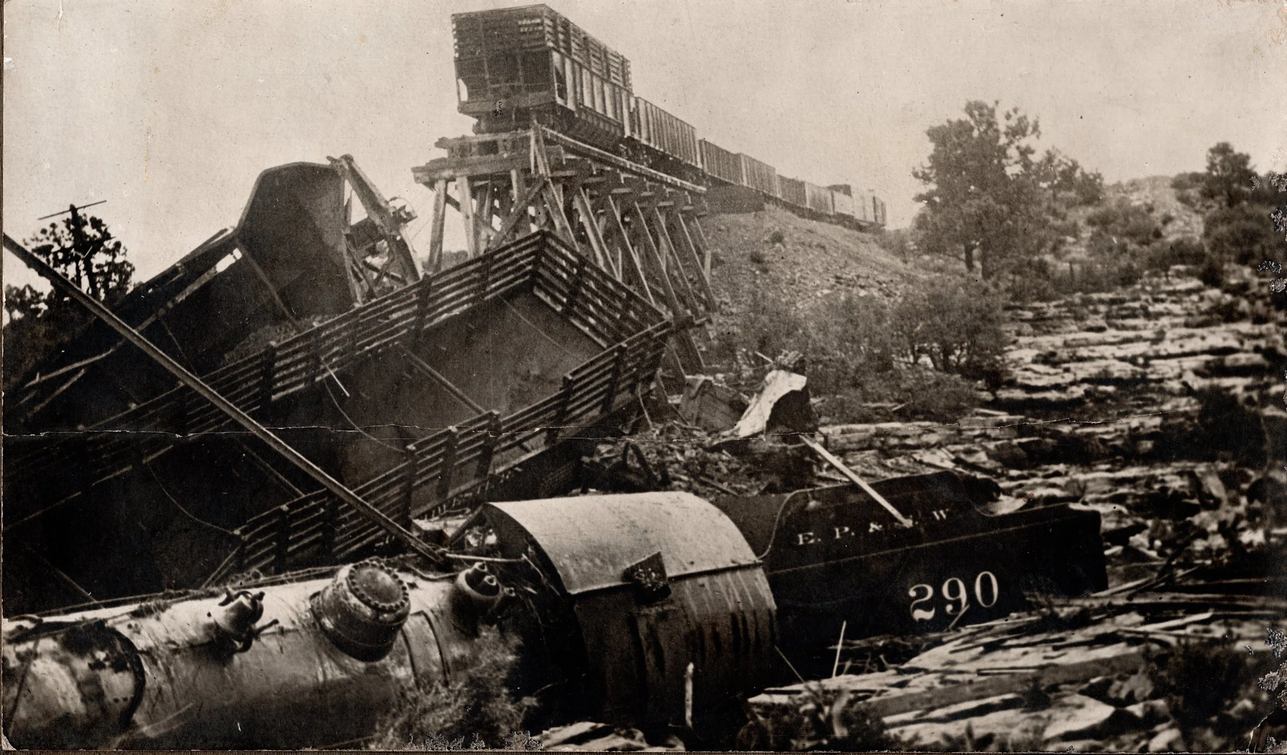 This wreck of El Paso & Southwestern 2-8-0 #290 occured after a flash flood.  There are several imaes of the temporary trackage laid to recover the locomotive. 
