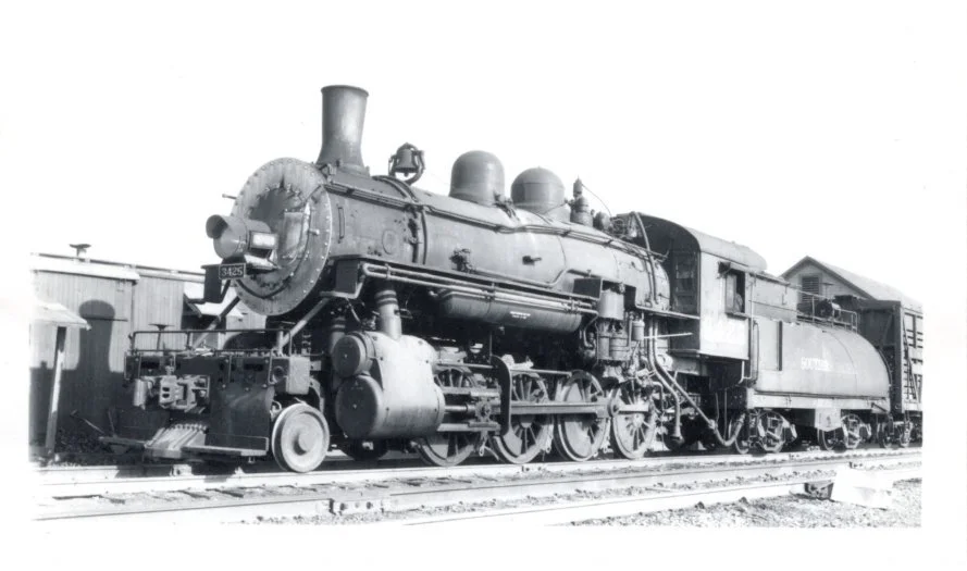 A view of the fireman's side of SP 3425 at Tucumcari, New Mexico.  This and the engineer's side view show a locomotive without train number boards indicating that the locomotive was primarily used for switching at the time the photo was taken.  Photo