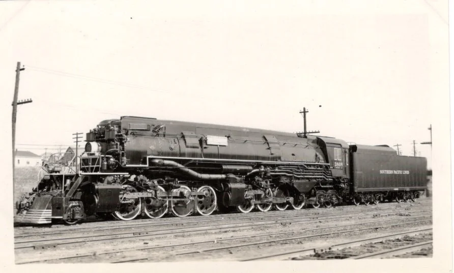 Here is a view of Southern Pacific 2-8-8-4 AC-9 class #3808 set out in Kansas City, Kansas.  The locomotive was enroute from the factory to El Paso for delivery for set up for the SP at El Paso.  This angle gives us a better view of the sign along th