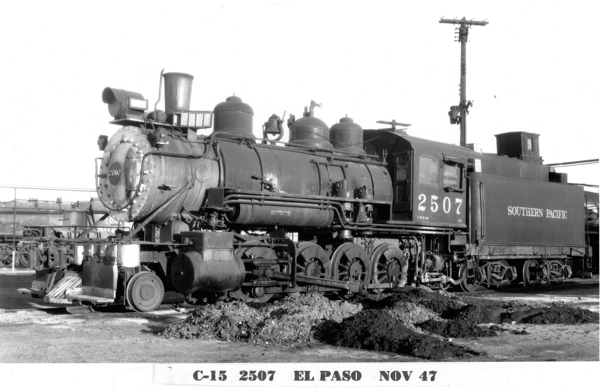 Southern Pacific 2-8-0 # 2507 C-15 at El Paso November 1947. Previously El Paso & Southwestern #183, El Paso & Northeastern #54.  Constructed by the Baldwin Locomotive Works in 1900.  The locomotive used coal as fuel at the time the Southern Pacific 