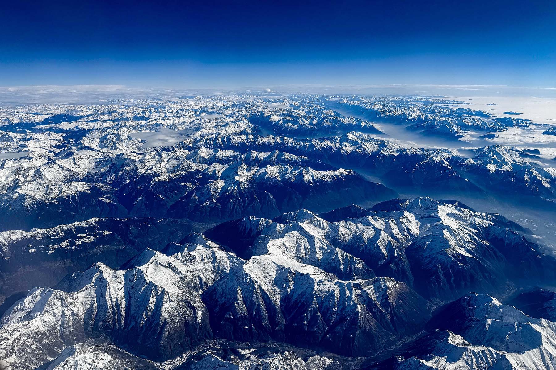 How do mountain ranges such as the Alps form?