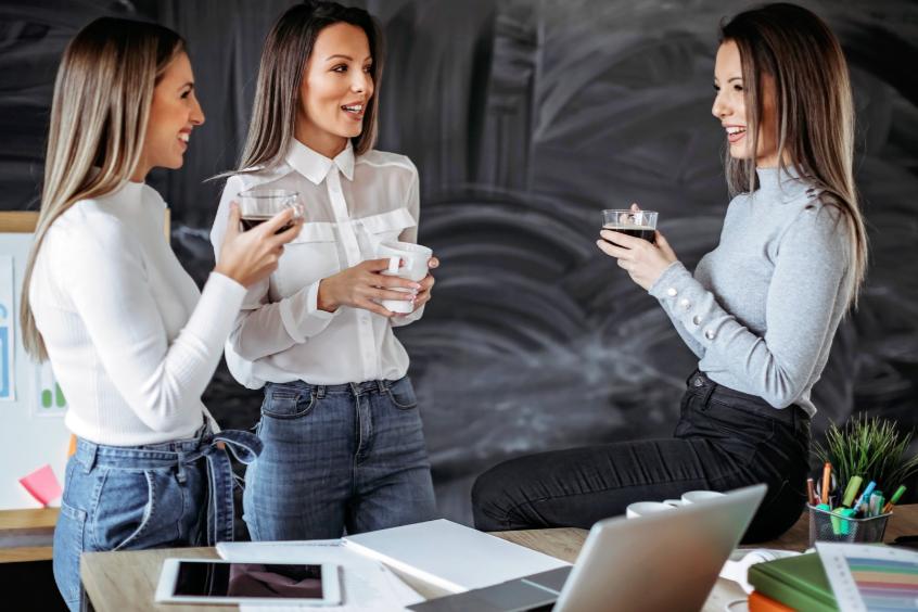 Woman at a social event looking thoughtful, representing the disconnect between small talk and real personal growth work